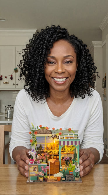 Woman holding a DIY miniature garden kit