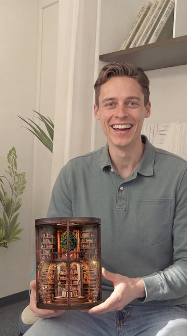 Woman holding a DIY miniature garden kit