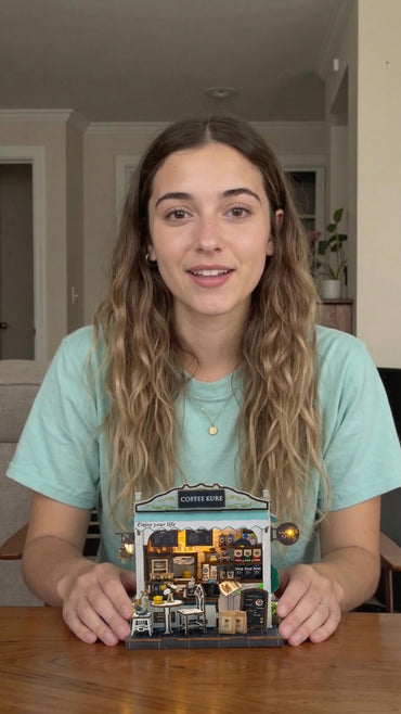 Woman holding a DIY miniature garden kit