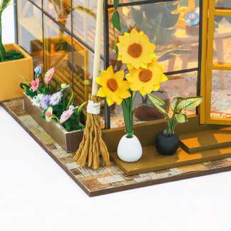 Sunshine Greenhouse DIY miniature house kit monstera and floral close-up
