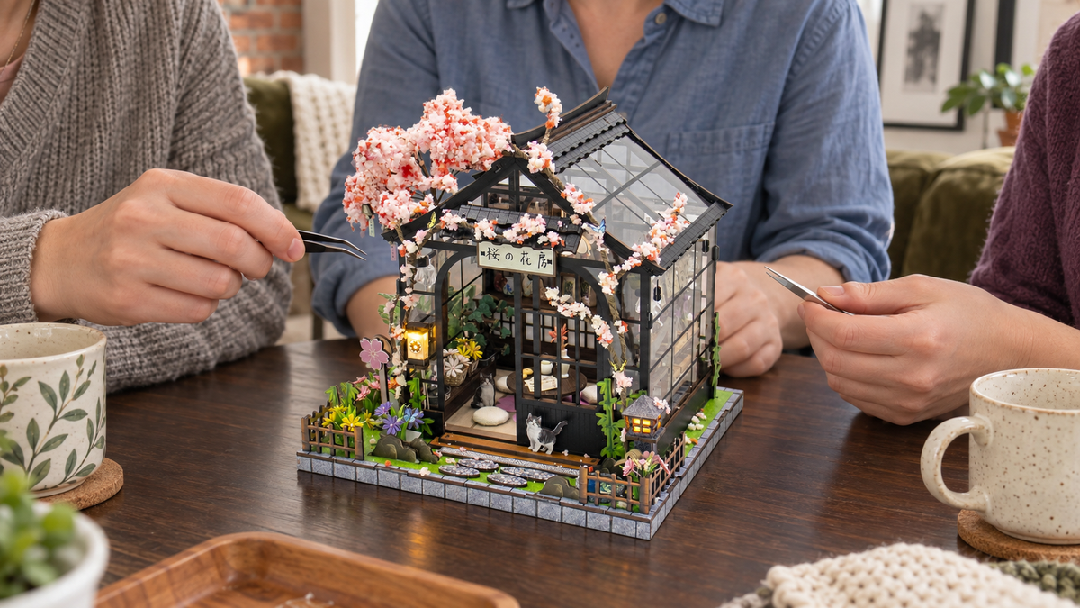 Sakura Greenhouse miniature kit during a shared craft session at home