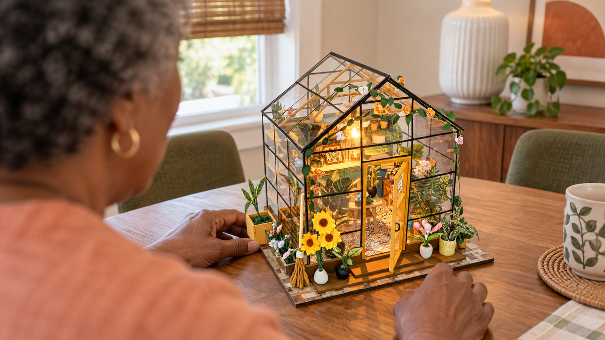 Sunshine Greenhouse miniature kit being enjoyed by one adult at home